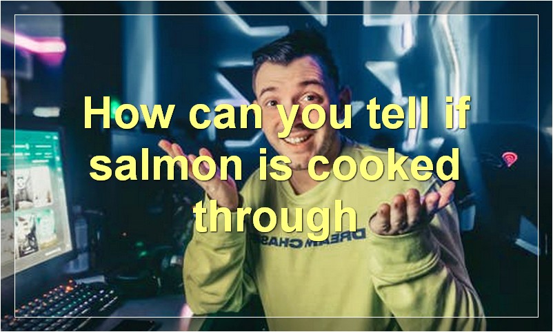 How can you tell if salmon is cooked through?
