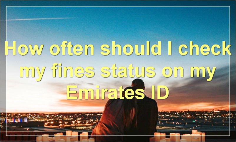 How often should I check my fines status on my Emirates ID?